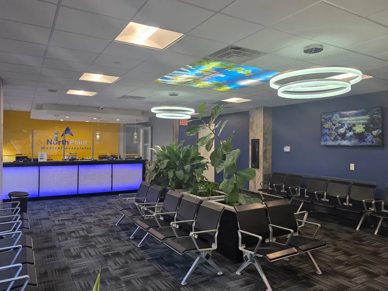 The NorthPoint Medical Associates reception desk with the practice name on the wall