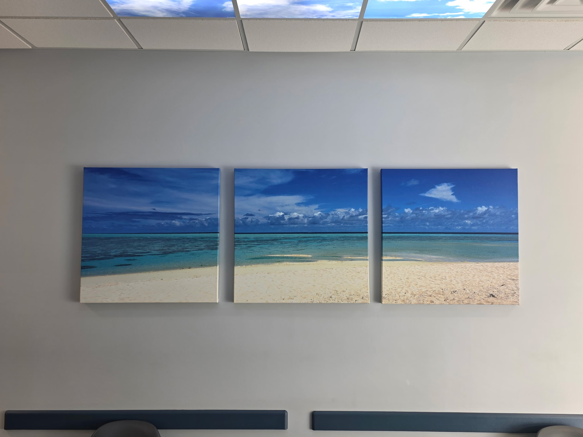 Patient seating beneath calming beach artwork inside NorthPoint Medical Associates
